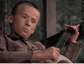 Boy playing banjo