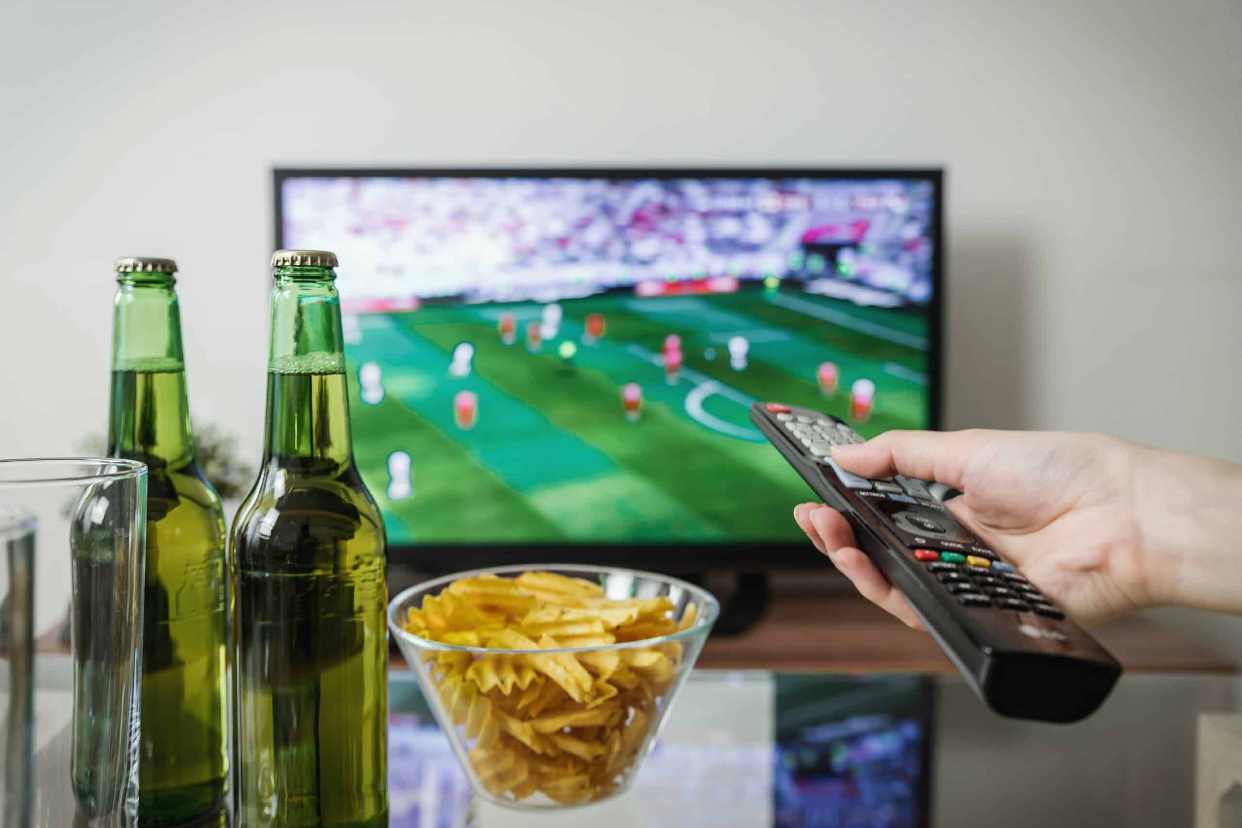 Person watching sports from home